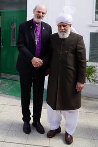 Photo: In front of the Fazl Mosque with âHis Holinessâ Mirza Masroor Ahmad, the fifth Caliph and leader of Ahmadiyya Muslims Â© BQ/Warnecke