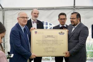 Handing over the plate (from left to right): Dr Ellis, Dr Schirrmacher, Dr Ramirez, Dr Santana