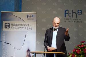 Photo: Thomas Schirrmacher bei seinem Vortrag © Martin Warnecke/IIRF